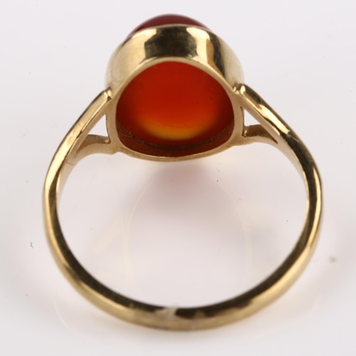 1210 - A late 20th century 9ct gold carnelian dress ring, set with oval cabochon carnelian, hallmarks Birmi... 