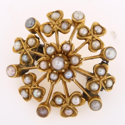 1213 - A Victorian split pearl floral starburst brooch, with flowerhead and shamrock motif, unmarked gold s... 