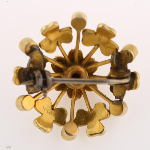 1213 - A Victorian split pearl floral starburst brooch, with flowerhead and shamrock motif, unmarked gold s... 