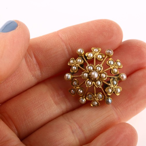 1213 - A Victorian split pearl floral starburst brooch, with flowerhead and shamrock motif, unmarked gold s... 