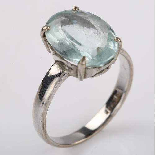 1219 - A 14ct white gold aquamarine dress ring, set with oval mixed-cut aqua, measures: 14.31 x 10.22 x 5.6... 