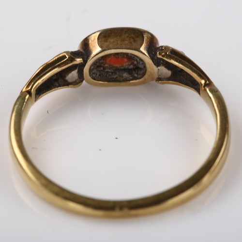 1220 - An Antique three stone garnet and diamond ring, unmarked gold settings with oval mixed-cut garnet an... 