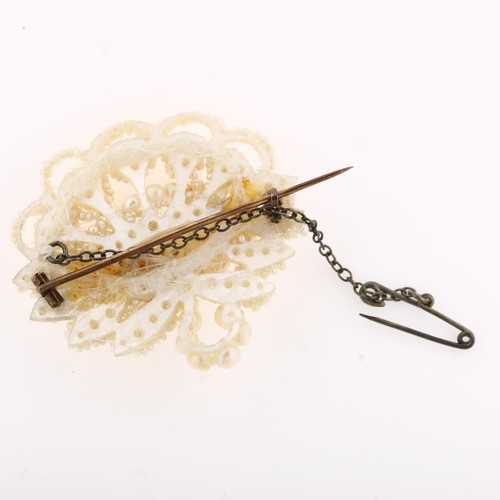 1225 - A Victorian seed pearl and mother-of-pearl openwork brooch, brooch length 39.6mm, 6.8g