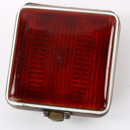 1036 - An Art Deco sterling silver and red enamel travelling bedside timepiece, square silvered dial with A... 