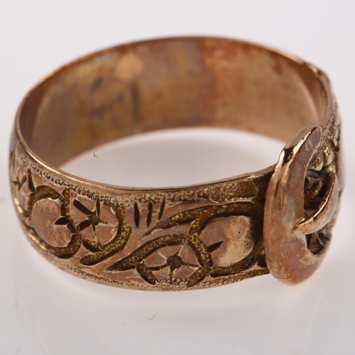 1231 - An early 20th century 9ct rose gold belt buckle band ring, with chased flowerhead and heart motif, m... 