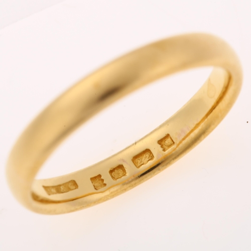 1235 - An early 20th century 22ct gold wedding band ring, maker's marks L W and G, hallmarks London 1928, b... 