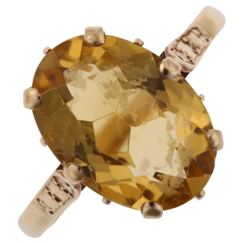 1237 - A late 20th century 9ct gold citrine dress ring, set with oval mixed-cut citrine, hallmarks Birmingh... 