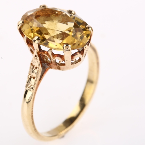 1237 - A late 20th century 9ct gold citrine dress ring, set with oval mixed-cut citrine, hallmarks Birmingh... 