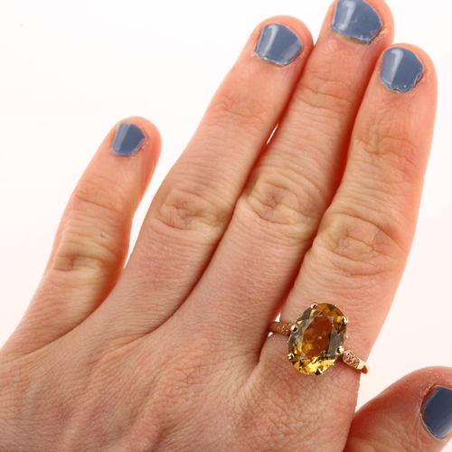 1237 - A late 20th century 9ct gold citrine dress ring, set with oval mixed-cut citrine, hallmarks Birmingh... 