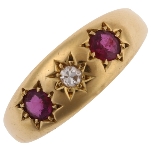 1241 - An early 20th century 18ct gold three stone ruby and diamond gypsy ring, set with round-cut ruby and... 