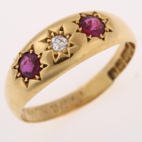 1241 - An early 20th century 18ct gold three stone ruby and diamond gypsy ring, set with round-cut ruby and... 