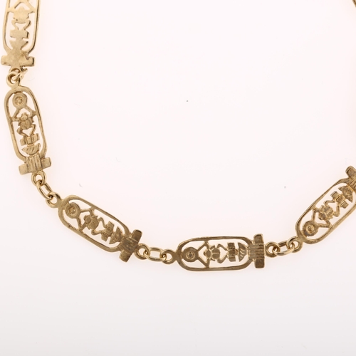 1242 - A modern 9ct gold Egyptian design panel bracelet, length 18cm, 4.7g