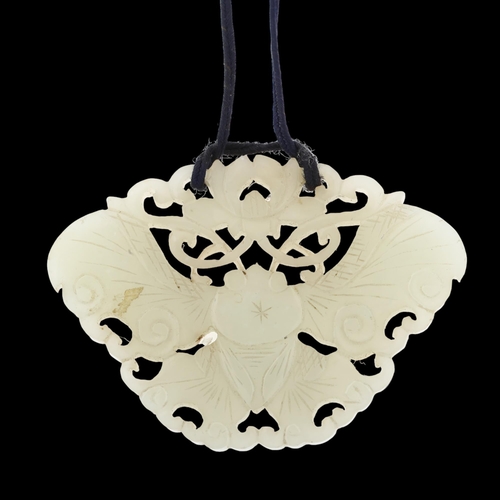 1249 - A large Chinese white jade butterfly amulet pendant, pierced and carved double-sided decoration, win... 