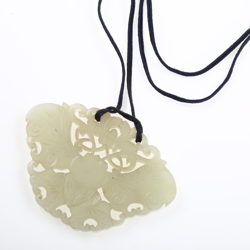 1249 - A large Chinese white jade butterfly amulet pendant, pierced and carved double-sided decoration, win... 