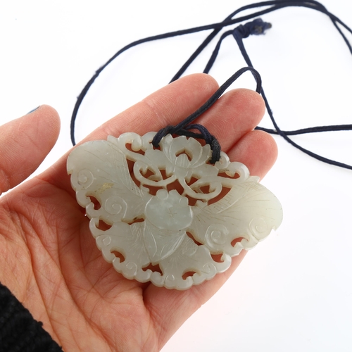 1249 - A large Chinese white jade butterfly amulet pendant, pierced and carved double-sided decoration, win... 