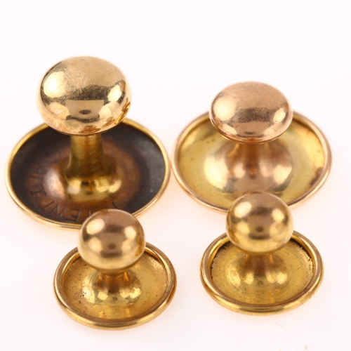 1260 - 4 gold dress studs, comprising 15ct (1.1g), and 9ct (2.1g)