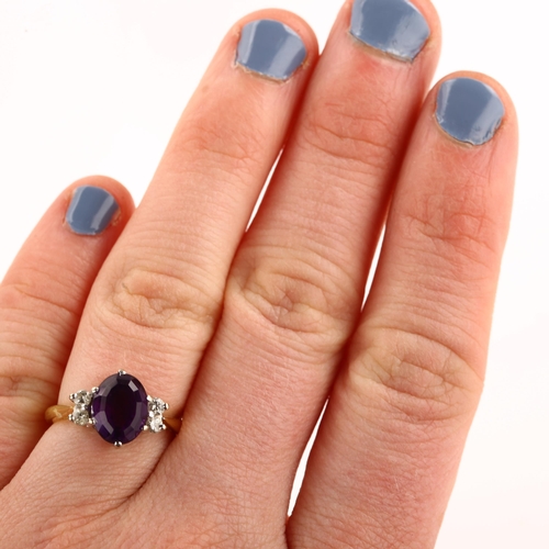 1275 - A late 20th century 18ct gold amethyst and diamond dress ring, set with oval mixed-cut amethyst and ... 