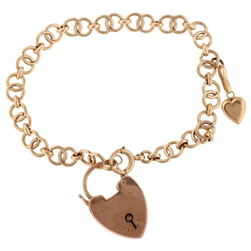 1280 - A mid-20th century 9ct gold hoop link bracelet, with 9ct padlock clasp charm, hallmarks Birmingham 1... 