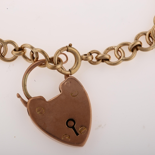 1280 - A mid-20th century 9ct gold hoop link bracelet, with 9ct padlock clasp charm, hallmarks Birmingham 1... 