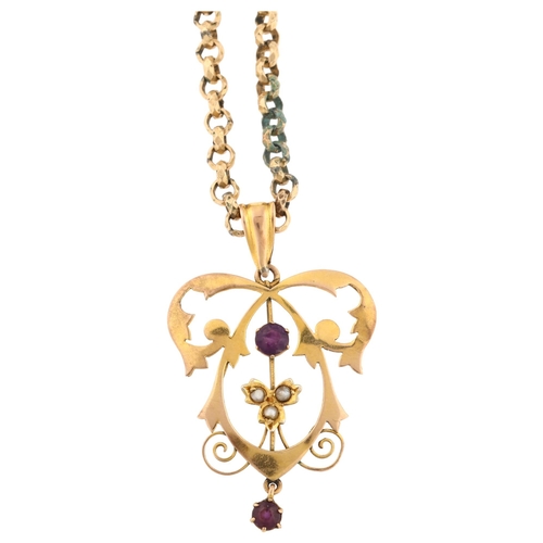 1285 - An Edwardian Art Nouveau 9ct gold amethyst and pearl openwork pendant necklace, on gold plated facet... 