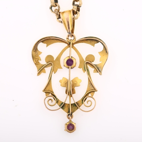 1285 - An Edwardian Art Nouveau 9ct gold amethyst and pearl openwork pendant necklace, on gold plated facet... 