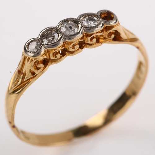 1290 - An early 20th century 18ct gold graduated five stone diamond half hoop ring, set with single and mod... 