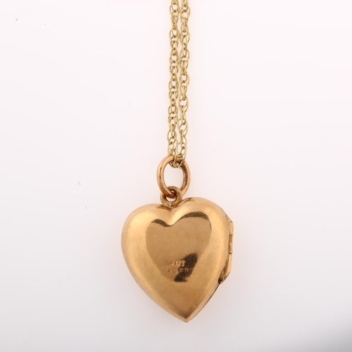 1295 - A 9ct gold back and front diamond heart locket pendant necklace, on 9ct fine Prince of Wales link ch... 