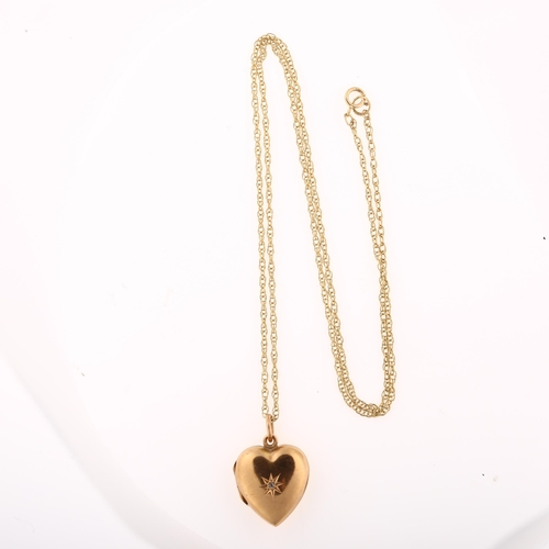 1295 - A 9ct gold back and front diamond heart locket pendant necklace, on 9ct fine Prince of Wales link ch... 