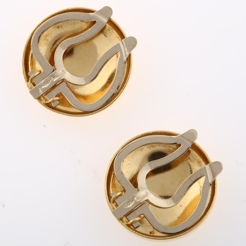 1296 - A pair of 18ct gold Naval anchor dress clips, diameter 16.3mm, 6.1g