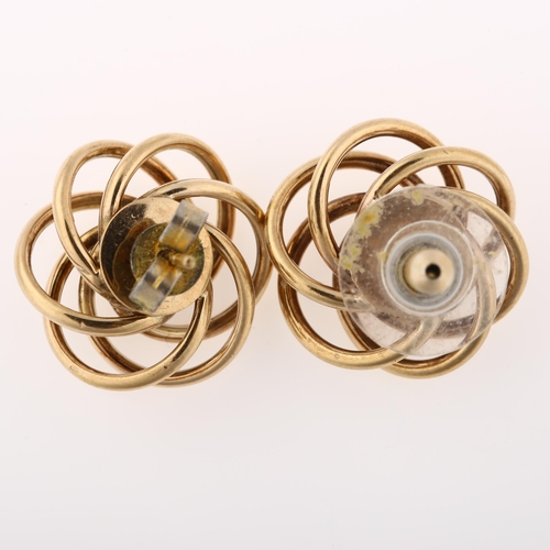 1300 - A pair of 9ct gold spiral openwork earrings with stud fittings, maker's marks C and F, earring diame... 