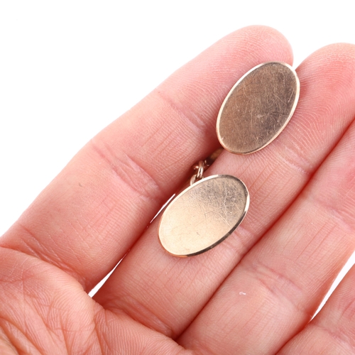 1305 - A pair of early 20th century 9ct rose gold cufflinks, plain oval panels, hallmarks Birmingham 1914, ... 