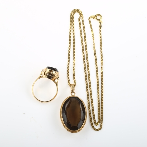 1306 - A 14ct gold smoky quartz jewellery set, comprising pendant necklace on 9ct chain and ring, pendant h... 