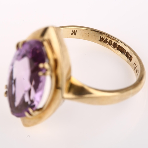 1309 - A mid-20th century 9ct gold amethyst dress ring, set with marquise-cut amethyst, hallmarks Birmingha... 