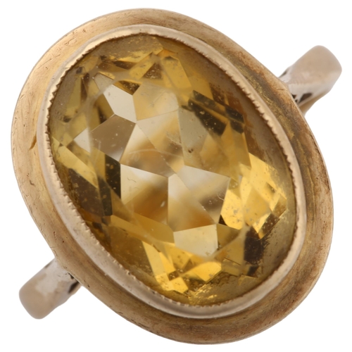 1310 - A mid-20th century 9ct gold citrine dress ring, set with oval mixed-cut citrine, hallmarks Birmingha... 