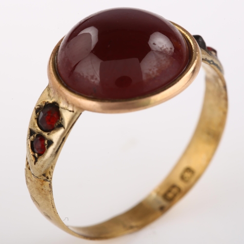 1312 - An Antique garnet dress ring, unmarked gold closed-back settings with round cabochon garnet, setting... 