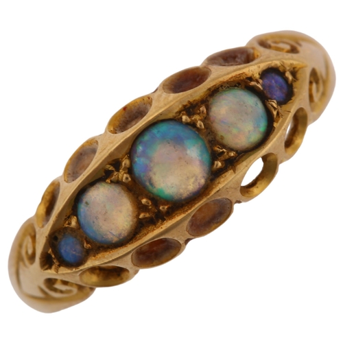 1317 - An early 20th century 18ct gold graduated five stone opal half hoop ring, set with round cabochon op... 