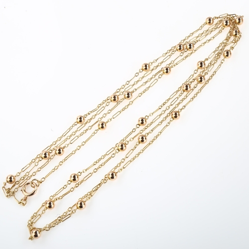 1319 - An Antique 9ct rose gold long guard chain necklace, with ball spacers, length 144cm, 17.3g