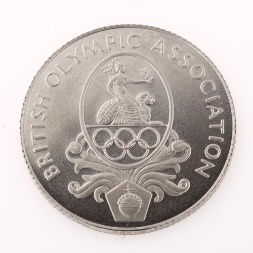 1320 - A 1976 British Olympic Association Montreal Games Platinum Award, 8.2g, boxed with certificate from ... 