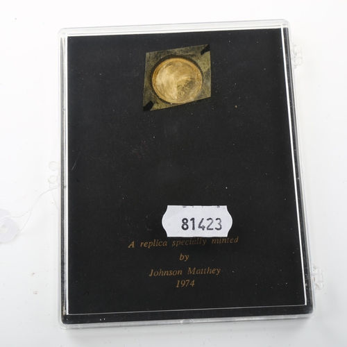 1323 - A 1974 replica Queen Anne gold touch piece coin, by Johnson Matthey, 1.7g