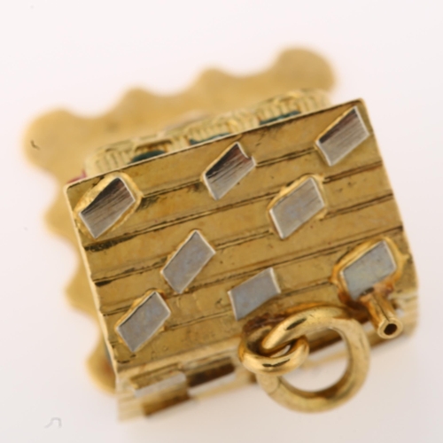 1333 - A Continental 18ct gold and enamel kinetic chalet charm, opening to reveal couple in bed, charm leng... 