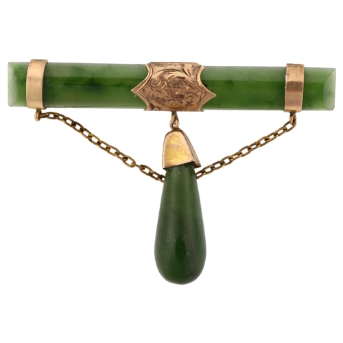 1347 - A Victorian 9ct gold mounted nephrite bar brooch, with nephrite drop, brooch length 50.8mm, 6.7g