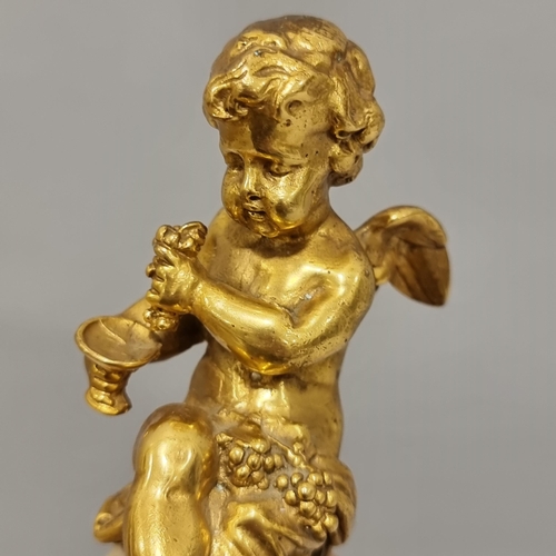 49 - A pair of cast-brass cherub figures on green onyx bases, height 14cm