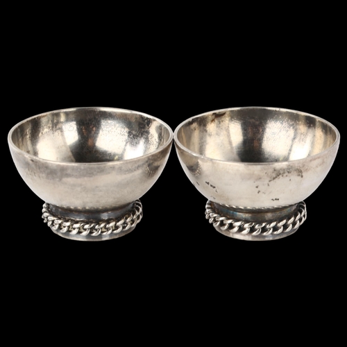 1525 - A pair of Art Deco French silver salt cellars, by Jean Depres, Paris, circa 1930, diameter 4cm