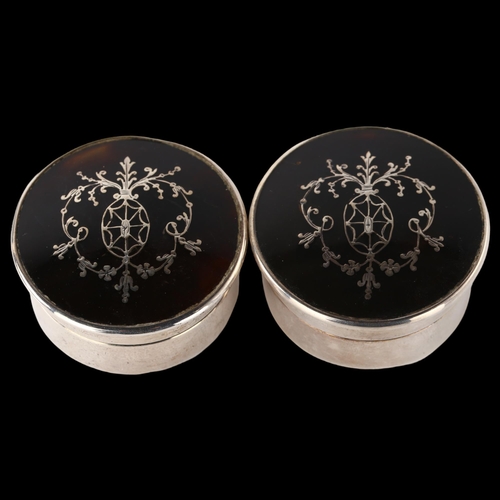 1531 - A pair of George V silver and tortoiseshell dressing table boxes, cylindrical form with pique inlaid... 