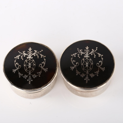 1531 - A pair of George V silver and tortoiseshell dressing table boxes, cylindrical form with pique inlaid... 