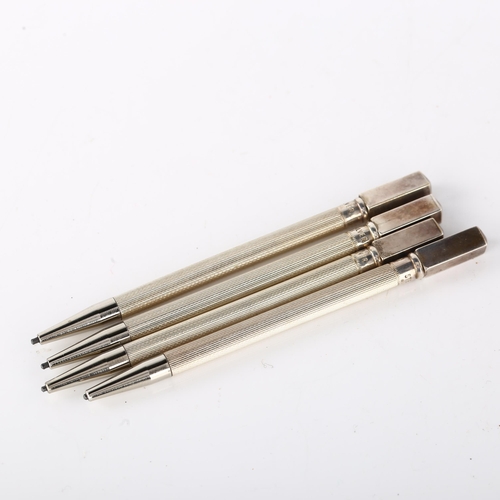 1540 - A cased set of sterling silver Bridge propelling pencils, length 8.5cm