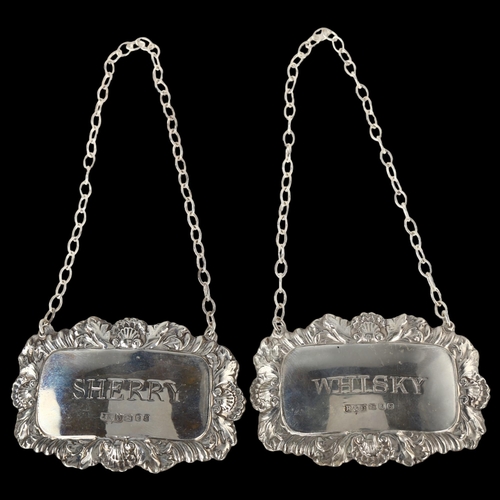 1544 - A pair of Elizabeth II silver decanter labels, comprising Sherry and Whisky, by Roberts & Dore Ltd, ... 