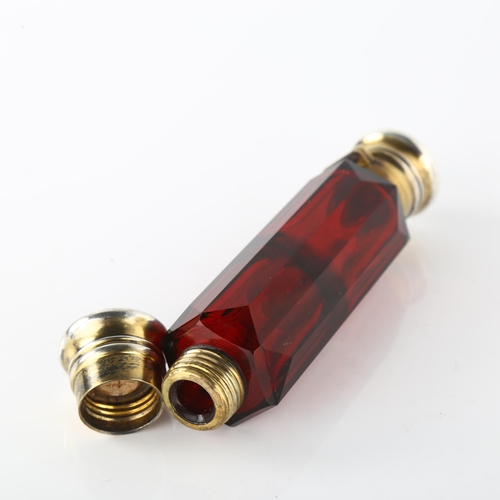 1551 - A 19th century silver-gilt mounted ruby glass double-ended scent flask, unmarked, length 13.5cm