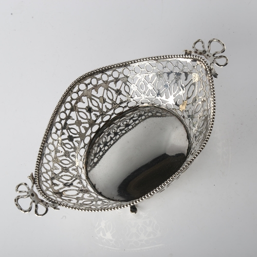 1560 - A Dutch silver 2-handled bon bon dish, pierced lattice decoration with bead edge and ribbon bow hand... 