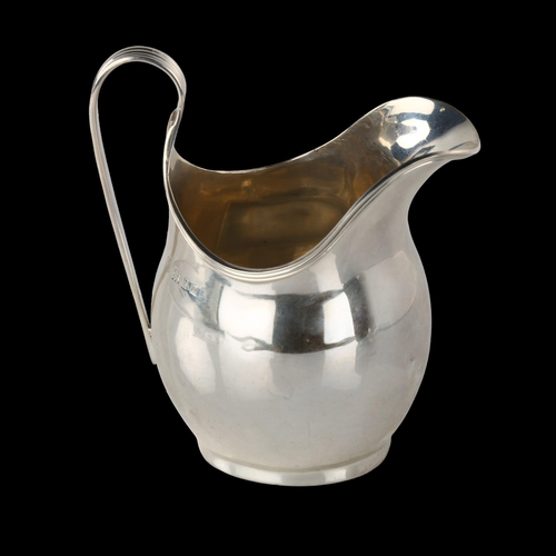 1563 - A George V silver helmet cream jug, bulbous form with reeded rim, by William Bruford & Son Ltd, hall... 